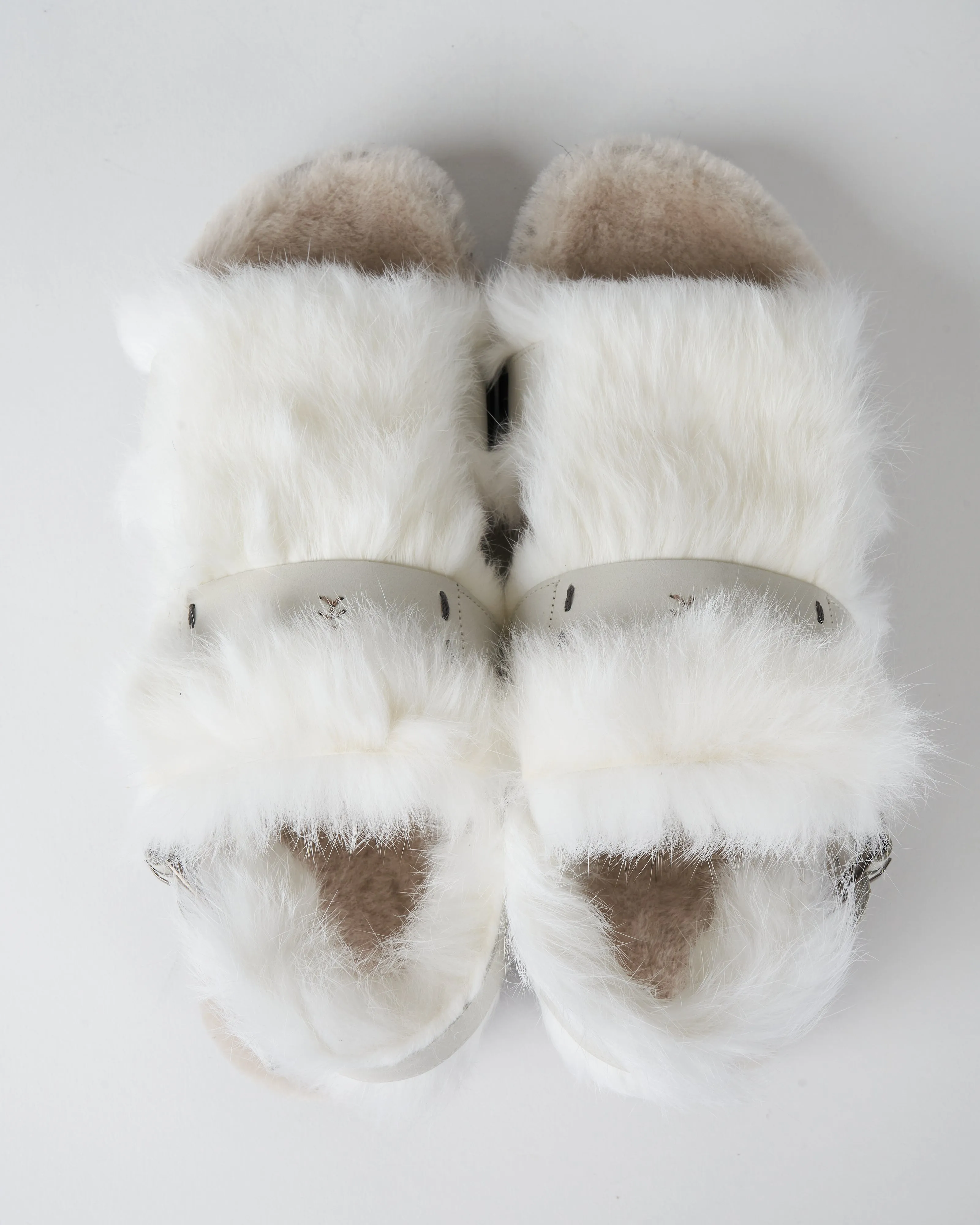 white sandal with white lapin